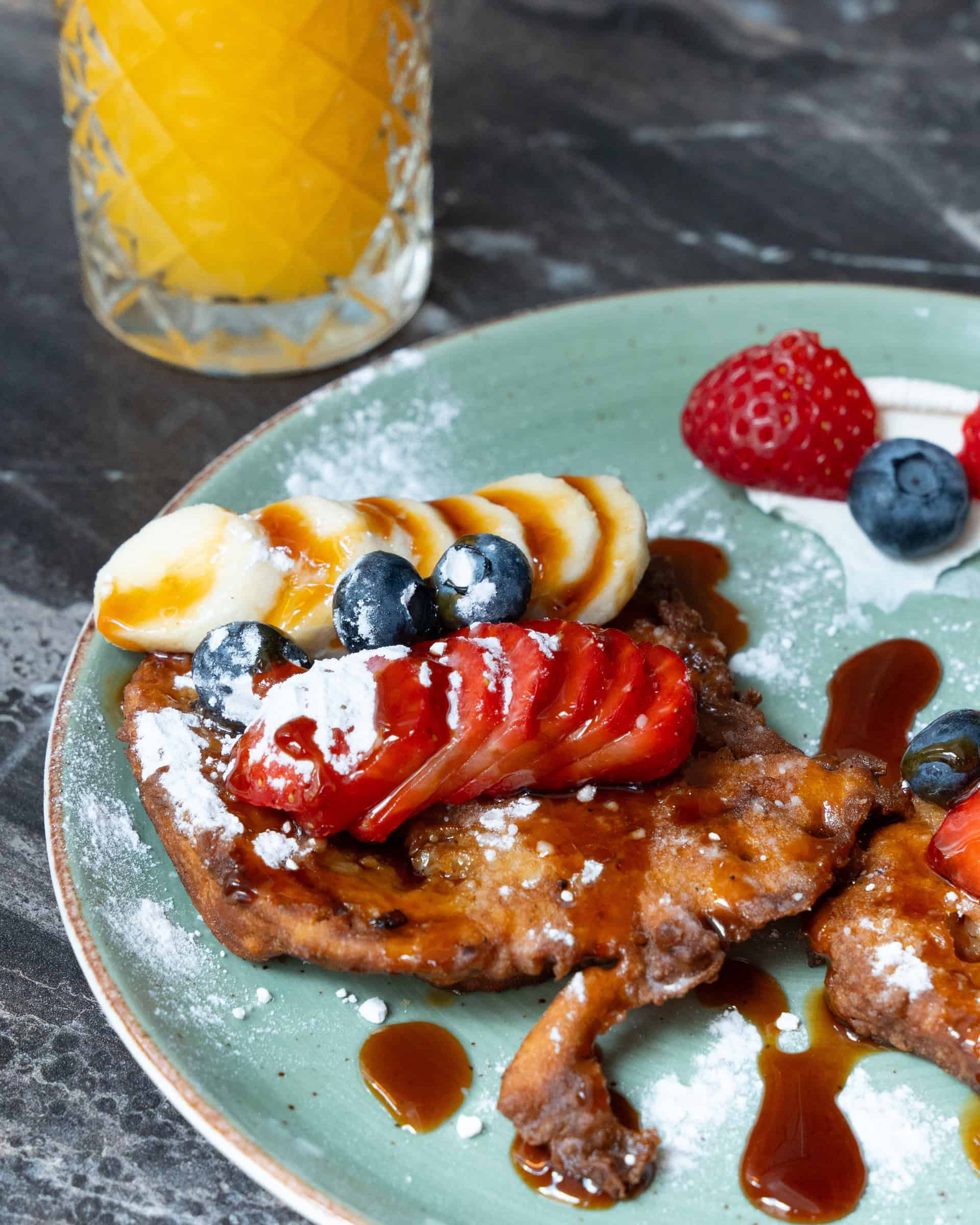 Close-up of fruit-topped French toast